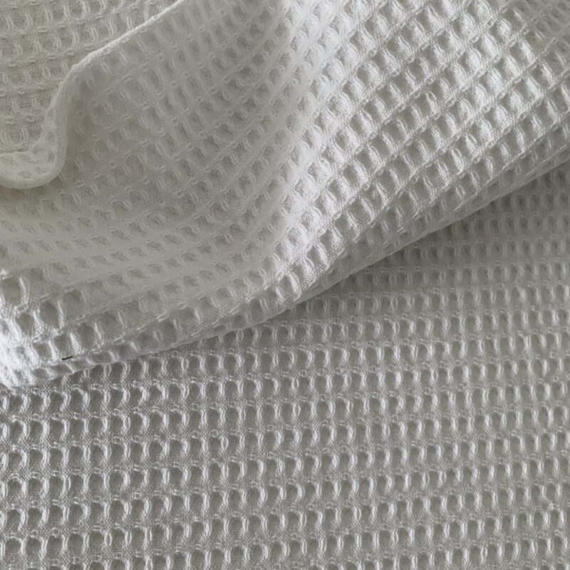 Tissu nid d'abeille blanc
