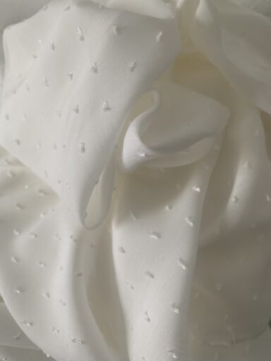 Tissu plumetis viscose ivoire