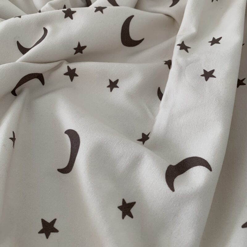Tissu jersey de coton lunes et étoiles