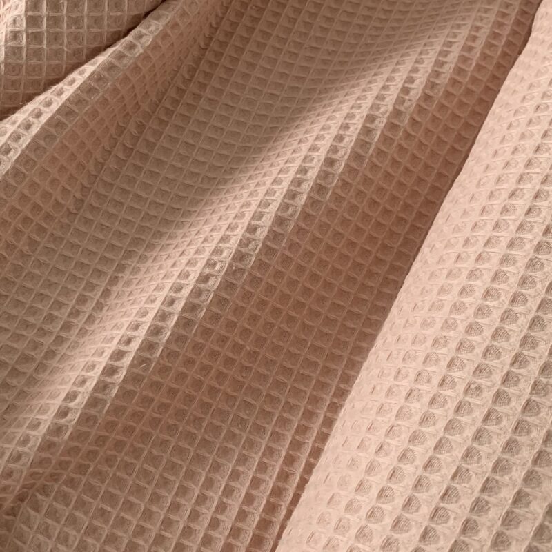 Tissu nid d'abeille rose poudré