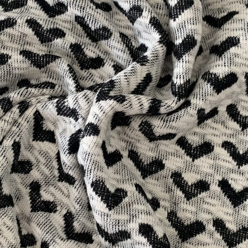 Tissu maille coeur noir et blanc