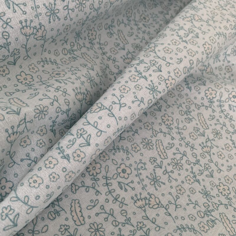 Tissu flanelle bleu motifs floraux