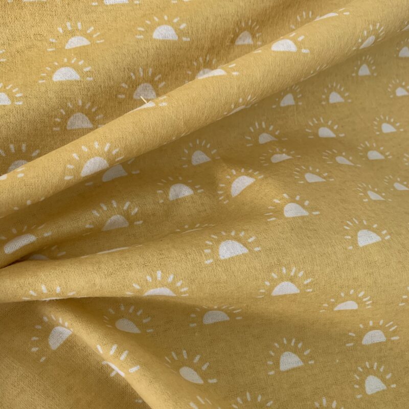 Tissu flanelle jaune motifs soleils