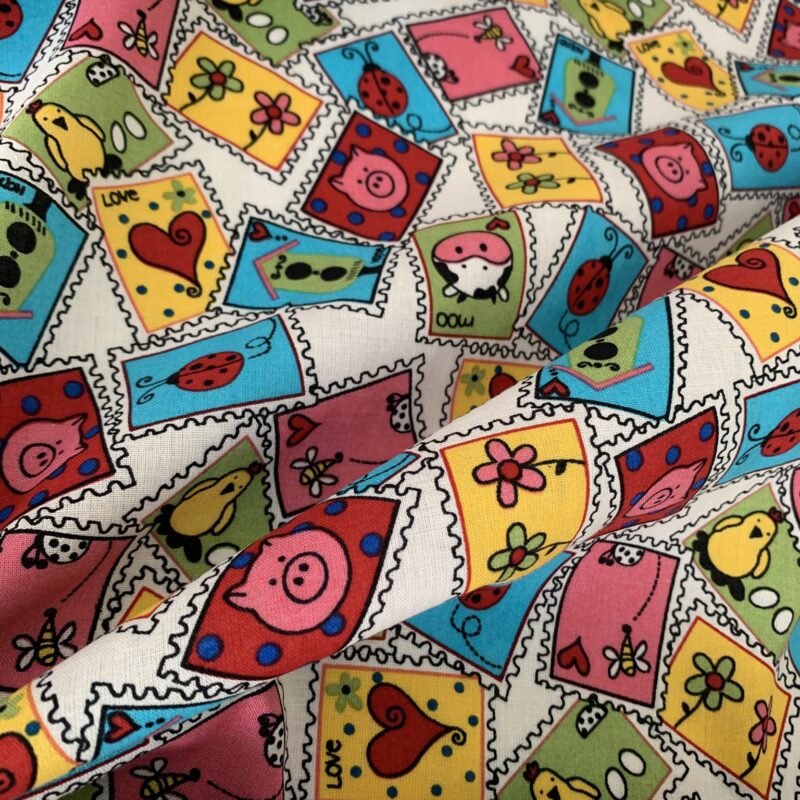 Tissu coton imprimé timbres animaux