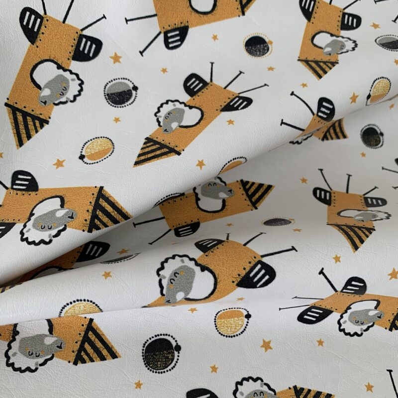 Tissu simili cuir souple imprimé fusées