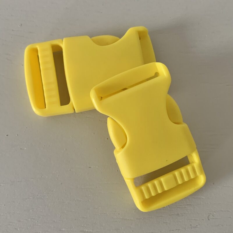 Boucle à coulisse plastique jaune 25mm