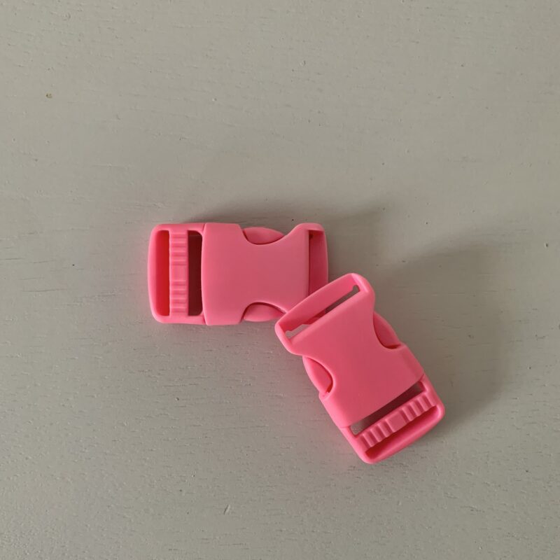 Boucle à coulisse plastique rose 25mm