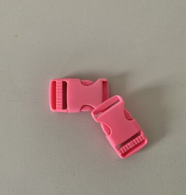 Boucle à coulisse plastique rose 25mm