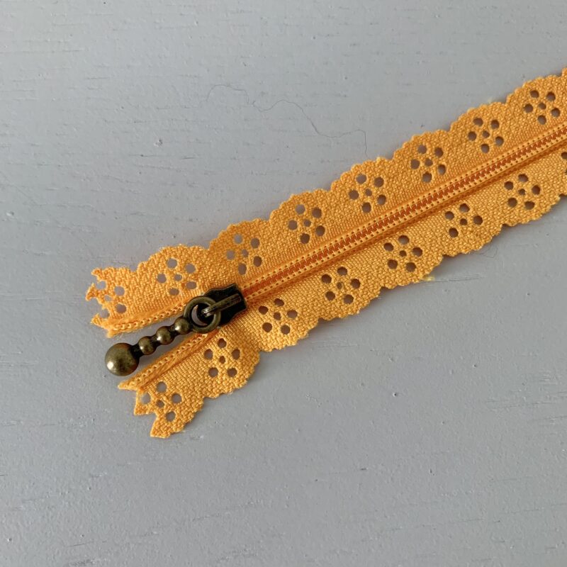 Fermeture à glissière fantaisie dentelle orange 20cm