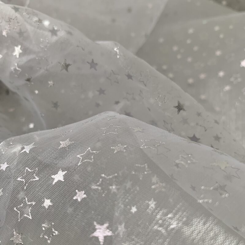 Tissu voile transparent étoiles argentées