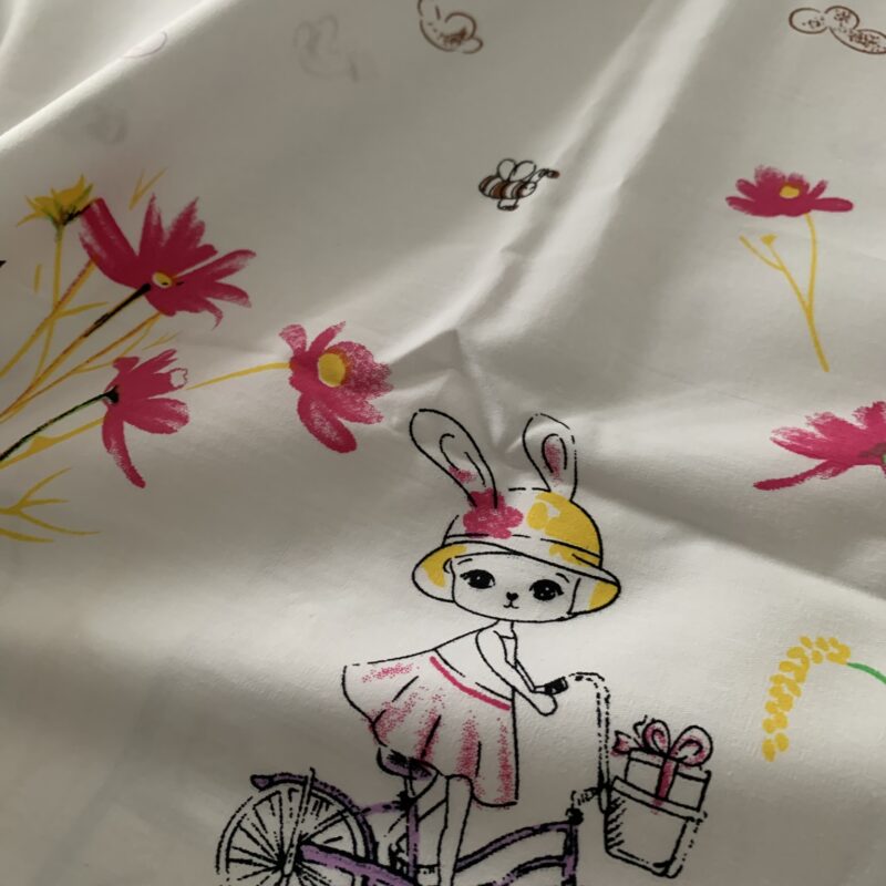 Tissu coton motifs lapin en bordure