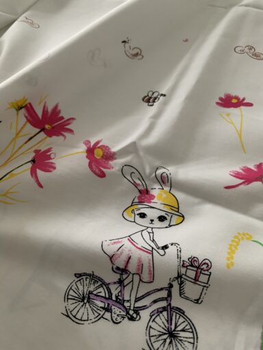 Tissu coton motifs lapin en bordure