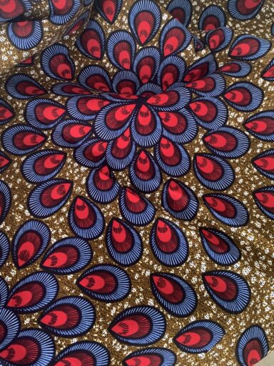 Tissu wax bleu et rouge plumes